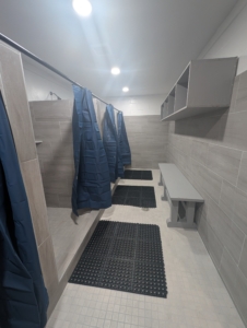 Men's Shower Rooms at The Phoenix House of Tuscaloosa